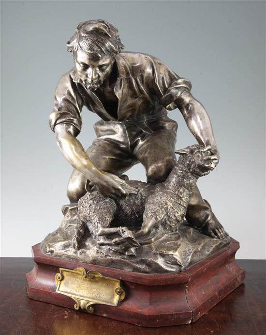 Courbet. A late 19th century French silvered bronze group of a shepherd shearing a sheep, H.17in.